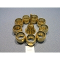 Lot of 9 Brass Hammered Napkin Rings & Dinner Bell