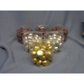 6 Containers of Floating Candles Silver Purple Gold