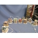 Lot of 11 Assorted Santa Christmas Village Porcelain
