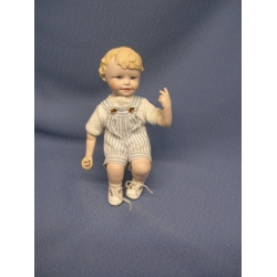 Porcelain Doll Sitting Boy