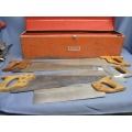 Lot of 6 Vintage Hand saws in a case