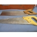Lot of 6 Vintage Hand saws in a case