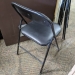 Black Metal Folding Chair w/ Padded Seat and Back