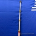 White and Red Telescoping Measuring Rod