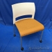 White/Orange Pattern Rolling Steelcase Move Stacking Guest Chair