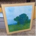 Tree in a Field Framed Print